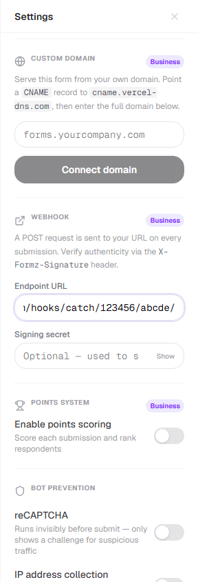 Settings panel's webhook section with an endpoint URL and signing secret field